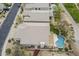 Aerial view of upscale homes showcasing private backyard pools and desert landscaping in a golf course community at 4864 E Eden Dr, Cave Creek, AZ 85331