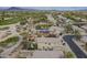 Desert homes with lush golf course views, many with solar panels and private pools at 4864 E Eden Dr, Cave Creek, AZ 85331