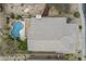 Home with a grey tile roof, pool and patio along with desert landscaping at 4864 E Eden Dr, Cave Creek, AZ 85331