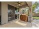 Back patio with outdoor cooking area and ceiling fan at 4864 E Eden Dr, Cave Creek, AZ 85331