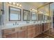 Bathroom with a long countertop with double sinks and large mirror at 4864 E Eden Dr, Cave Creek, AZ 85331