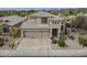 Beautiful desert-landscaped home boasts a three-car garage and a tile roof at 4864 E Eden Dr, Cave Creek, AZ 85331