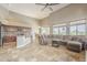 Open-concept living space includes a dining area and kitchen, all enhanced by high ceilings and tile flooring at 4864 E Eden Dr, Cave Creek, AZ 85331