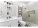 Modern bathroom with glass walk-in shower, sleek vanity, and stylish fixtures at 5036 N Scottsdale Rd, Paradise Valley, AZ 85253