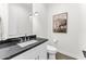 Bathroom featuring a modern vanity with black countertop and pendant lighting at 5036 N Scottsdale Rd, Paradise Valley, AZ 85253