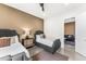 Comfortable bedroom offers twin beds and ensuite access to the living room at 5036 N Scottsdale Rd, Paradise Valley, AZ 85253
