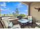 Relaxing outdoor balcony with seating, a table and mountain views at 5401 E Van Buren St # 3113, Phoenix, AZ 85008