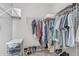 Organized walk-in closet with shelving, hanging rods, and shoe racks for ample storage at 5401 E Van Buren St # 3113, Phoenix, AZ 85008