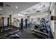Community gym featuring cardio machines, weightlifting equipment, and ample space for residents at 5401 E Van Buren St # 3113, Phoenix, AZ 85008