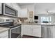 Well-equipped kitchen featuring stainless steel appliances and modern finishes at 5401 E Van Buren St # 3113, Phoenix, AZ 85008