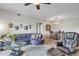 Open-concept living room with stylish furniture and ample natural light at 5401 E Van Buren St # 3113, Phoenix, AZ 85008