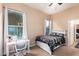 Charming bedroom with natural light and a cozy atmosphere perfect for relaxation and sleep at 5528 W Mine Trl, Phoenix, AZ 85083