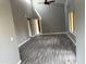 Spacious living room with vaulted ceilings, ceiling fan, neutral walls, and wood look flooring at 7008 E Gold Dust Ave # 234, Paradise Valley, AZ 85253