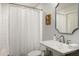 Bathroom featuring a white vanity, shower, and white subway tile at 7635 E Sweetwater Ave, Scottsdale, AZ 85260