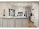 Gourmet kitchen boasts marble countertops, custom cabinets, and an open design at 7635 E Sweetwater Ave, Scottsdale, AZ 85260