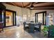 Covered outdoor patio area featuring a dining table and chairs, perfect for outdoor entertaining at 7635 E Sweetwater Ave, Scottsdale, AZ 85260