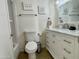 Bright bathroom features vanity with stylish mirror, bathtub and modern decor at 8055 E Thomas Rd # G101, Scottsdale, AZ 85251