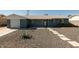Charming single-story home with well-maintained gravel yard, walkway and gray exterior paint at 8115 E Cypress St, Scottsdale, AZ 85257