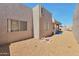 Expansive backyard with neutral gravel and a small fire pit at 876 W El Monte Pl # 3, Chandler, AZ 85225