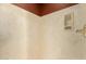 Modern bathroom shower with travertine tile and updated showerhead at 8785 E Sandtrap Ct, Gold Canyon, AZ 85118