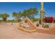 Gold Canyon Golf Resort sign surrounded by desert landscape and lush green grass at 8785 E Sandtrap Ct, Gold Canyon, AZ 85118
