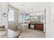 Luxurious primary bathroom with a tub, separate glass shower, and granite countertops at 9285 E Canyon Vw, Scottsdale, AZ 85255