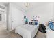 Bedroom with sliding closet doors, soft carpet flooring, and bright light at 9285 E Canyon Vw, Scottsdale, AZ 85255
