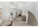 Expansive foyer with staircase, neutral tile flooring, formal living, and an abundance of natural light at 9285 E Canyon Vw, Scottsdale, AZ 85255