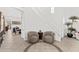 Grand foyer showcasing tile flooring, decorative inlay, staircase, and inviting seating area at 9285 E Canyon Vw, Scottsdale, AZ 85255