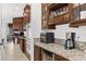 Gourmet kitchen showcasing stainless steel appliances, custom cabinets, and granite countertops at 9285 E Canyon Vw, Scottsdale, AZ 85255