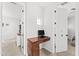 Neutral office nook featuring a built-in desk, window and easy access to two additional living spaces at 9285 E Canyon Vw, Scottsdale, AZ 85255