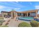 Expansive backyard featuring a pool, covered patio, and desert-inspired landscaping at 9620 E Roadrunner Dr, Scottsdale, AZ 85262