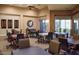 Well-lit game room featuring tables, chairs, and tasteful decor for entertainment and socializing at 9620 E Roadrunner Dr, Scottsdale, AZ 85262