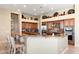 Spacious kitchen featuring custom cabinetry, granite countertops, and stainless steel appliances at 9620 E Roadrunner Dr, Scottsdale, AZ 85262