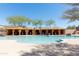 Resort-style community pool featuring private cabanas, ample seating, and lush landscaping for ultimate relaxation at 9858 E South Bend Dr, Scottsdale, AZ 85255