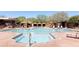 Upscale community pool and spa surrounded by cabanas and comfortable seating, perfect for relaxation at 9858 E South Bend Dr, Scottsdale, AZ 85255