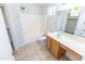 Bright bathroom features a shower-tub combo and a single sink vanity at 1366 E Desert Fern Trl, Casa Grande, AZ 85122