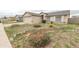 Charming single-story home featuring desert landscaping, gravel yard, and a two car garage at 1366 E Desert Fern Trl, Casa Grande, AZ 85122
