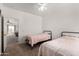 Inviting bedroom with a carpet and two twin beds, designed for restful nights at 1472 E Avenida Kino --, Casa Grande, AZ 85122