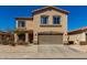 Charming two-story home with a two-car garage, covered entry, and desert landscaping at 1472 E Avenida Kino --, Casa Grande, AZ 85122