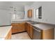 Traditional-style kitchen featuring wooden cabinets and stainless steel appliances in a bright setting at 1472 E Avenida Kino --, Casa Grande, AZ 85122