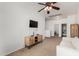 Upstairs landing with carpet, a television, and adjacent rooms at 1472 E Avenida Kino --, Casa Grande, AZ 85122