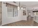 Bright dining area showcasing tile floors and view into living area at 15136 W Cactus Ridge Way, Surprise, AZ 85374