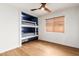 Bedroom with built-in bunkbeds and painted in a modern style at 1701 E Countrywalk Ln, Chandler, AZ 85225