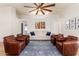 Spacious living room with comfortable seating, and stylish decor at 1701 E Countrywalk Ln, Chandler, AZ 85225