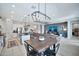 Open-concept living area connecting to the kitchen, featuring contemporary design and finishes at 18394 W Lupine Ave, Goodyear, AZ 85338