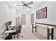 Bright office with a ceiling fan and natural light at 18394 W Lupine Ave, Goodyear, AZ 85338
