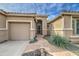 Inviting front entrance with a stone pathway and a decorative 'hello' sign on the front door at 1893 W Canary Way, Chandler, AZ 85286