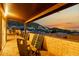 Serene balcony with stone flooring and city views, perfect for relaxation and enjoying the picturesque scenery at 21 W Beryl Ave, Phoenix, AZ 85021