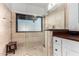 The primary bathroom offers a glass enclosed shower and tile surround at 21 W Beryl Ave, Phoenix, AZ 85021